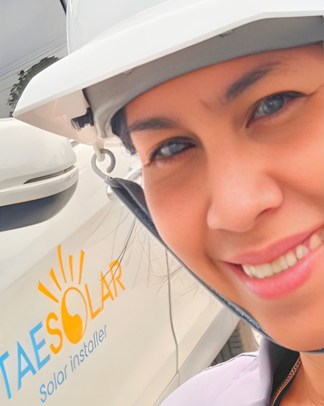 Sa, co-founder of TAE Solar, in a hard hat on site