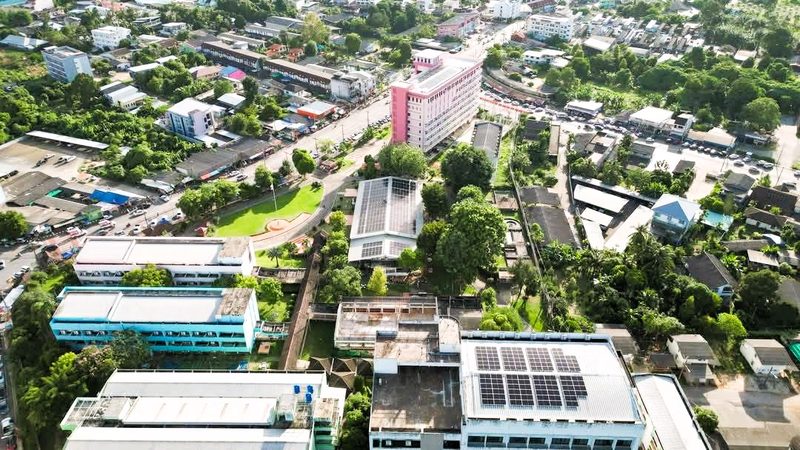 Aerial view of the college campus with solar panels on the roofs