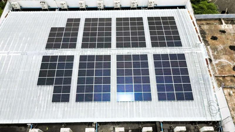 Rows of panels on a flat metal roof