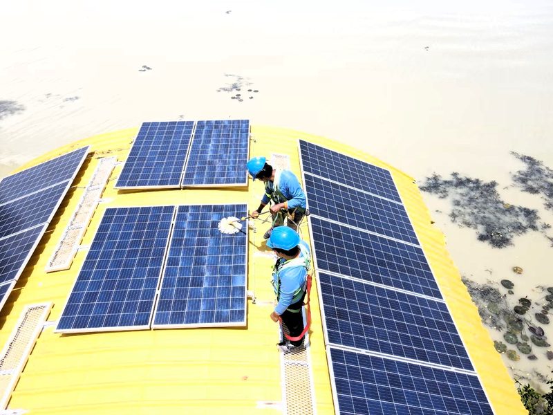 Boat roof with the finished solar array over the lake