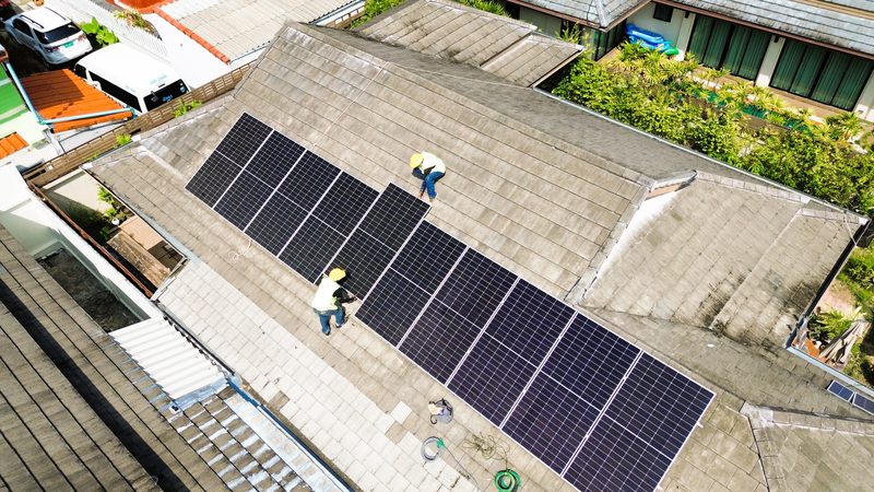 Aerial view of a rooftop solar array on a tiled house in Kathu, Phuket